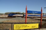 An F59 shoving out of Charlotte passes 36th Street station.